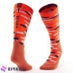 جوراب اسکی بچه گانه ودز مدل Wedze Orange Patterned 100