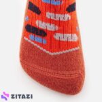 جوراب اسکی بچه گانه ودز مدل Wedze Orange Patterned 100