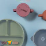 لیوان آموزشی سیلیکونی دوکاره اله‌له با دسته و نی رنگ طوسی
