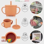 لیوان آموزشی سیلیکونی دوکاره اله‌له با دسته و نی رنگ نارنجی